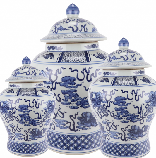 a group of blue and white vases