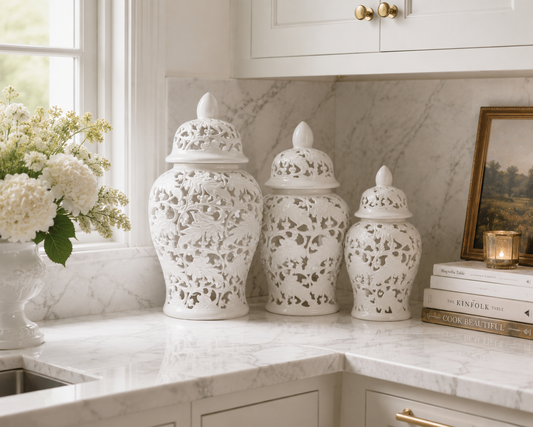 a white vases on a counter