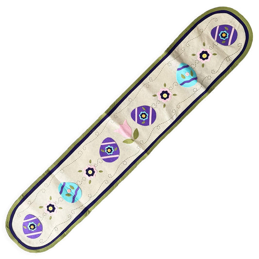 a long white rectangular object with a design on it