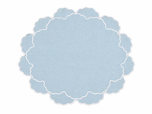 a blue and white cloud shaped placemat
