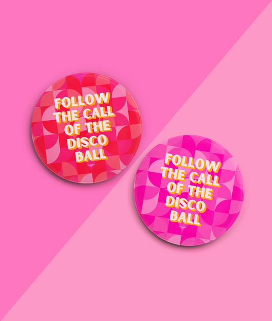 a pair of round red and pink badges