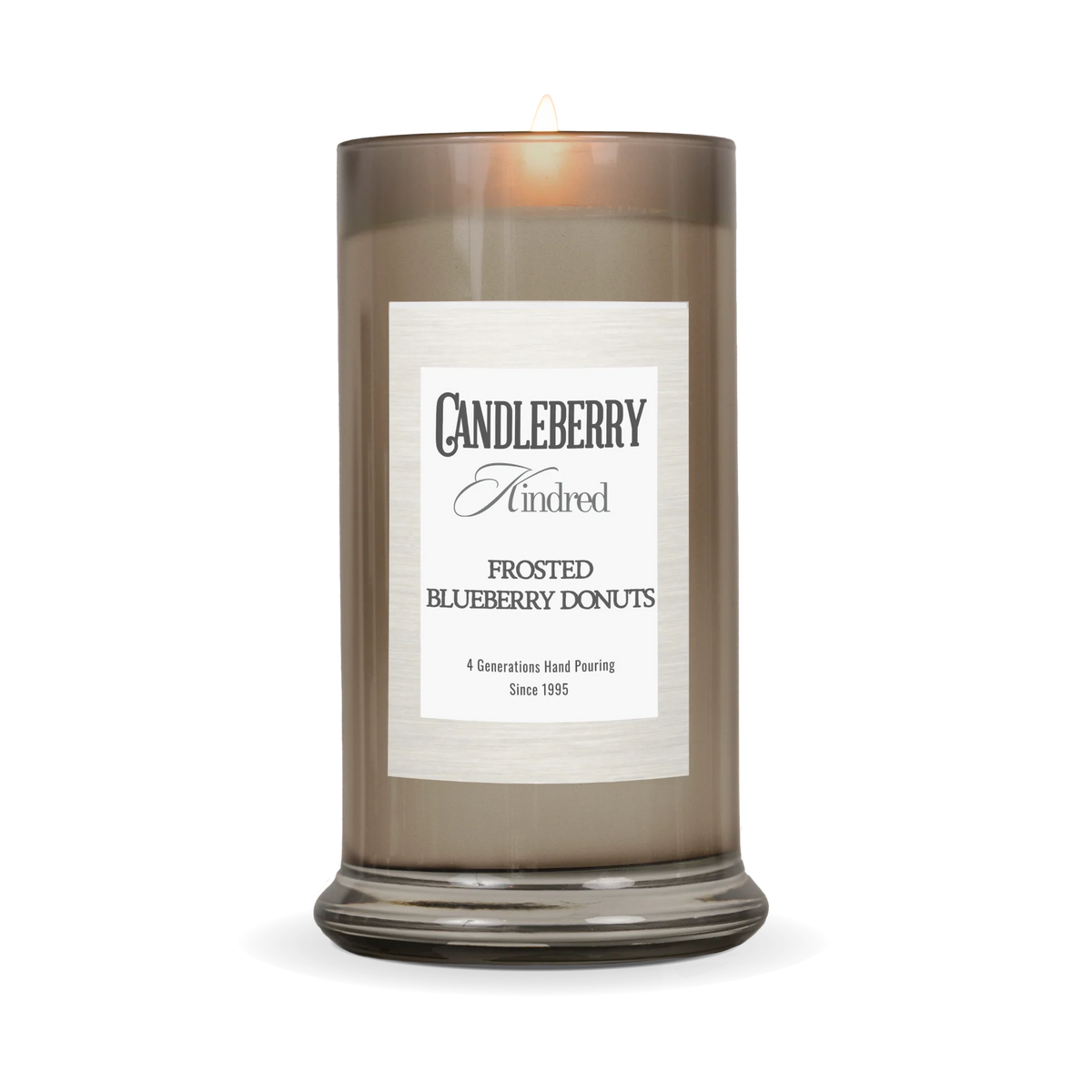 a candle in a glass container