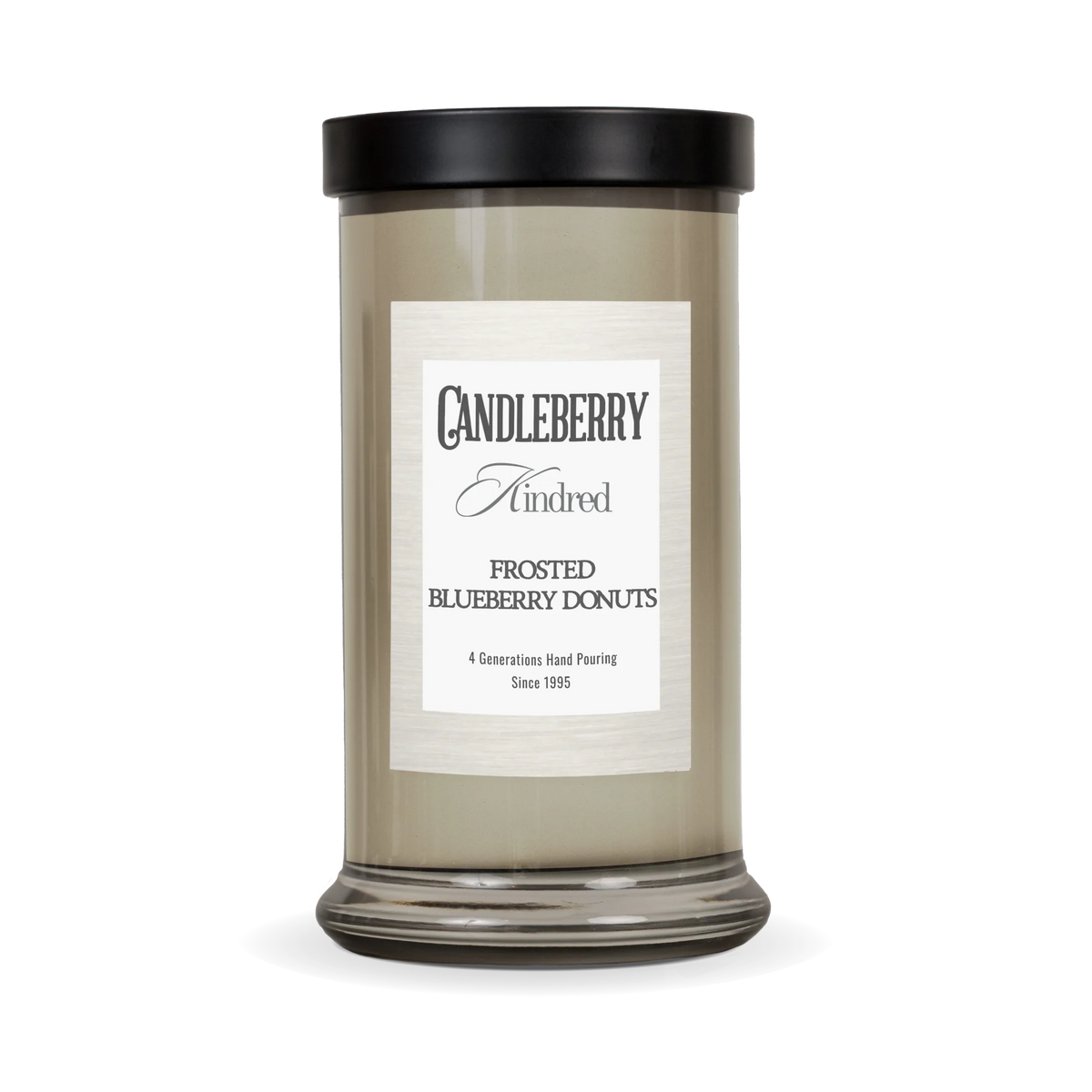 a candle in a glass container