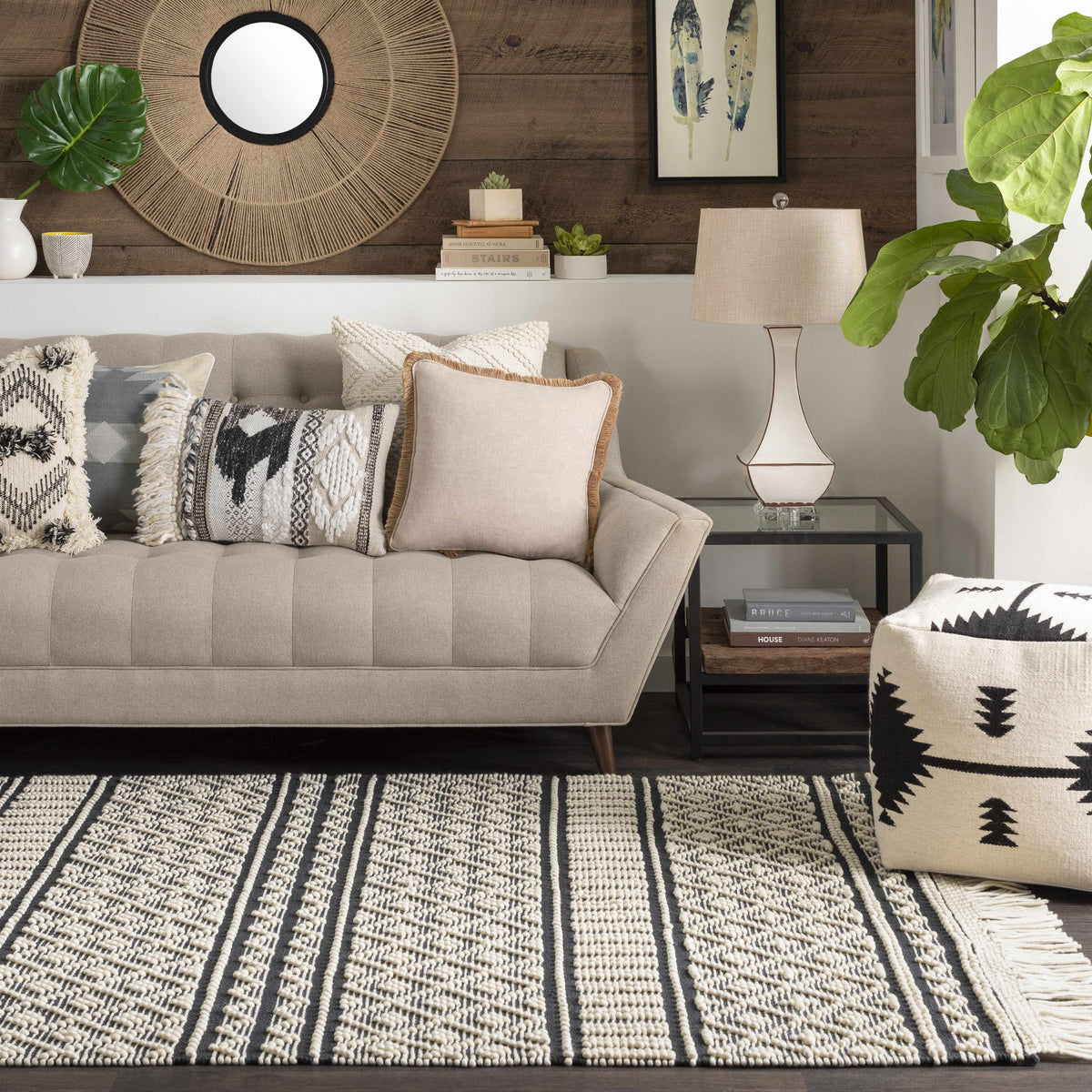 a couch with pillows in a room