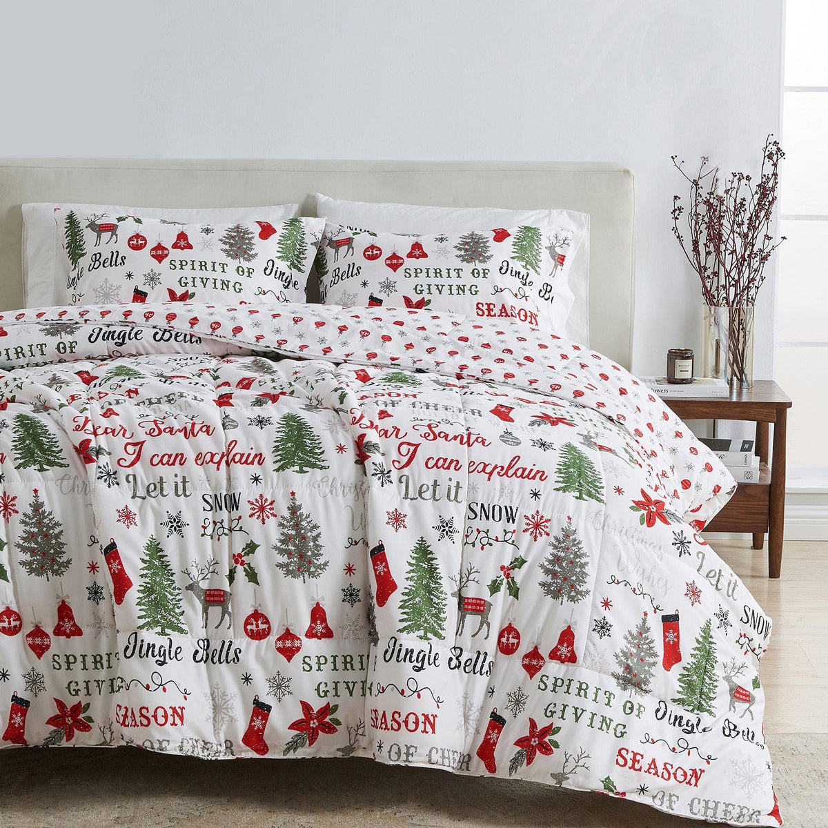 a bed with a white blanket and pillows