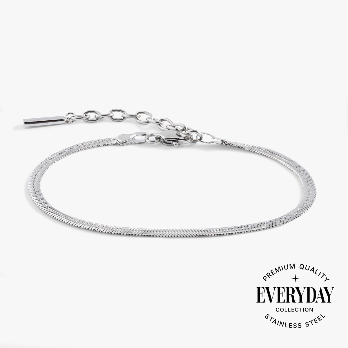 a silver bracelet with a silver bar