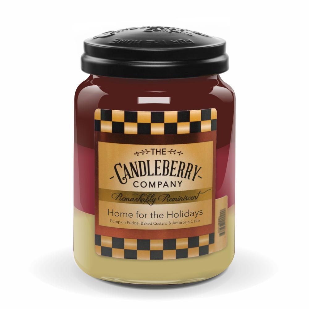 a jar of candle with a black lid