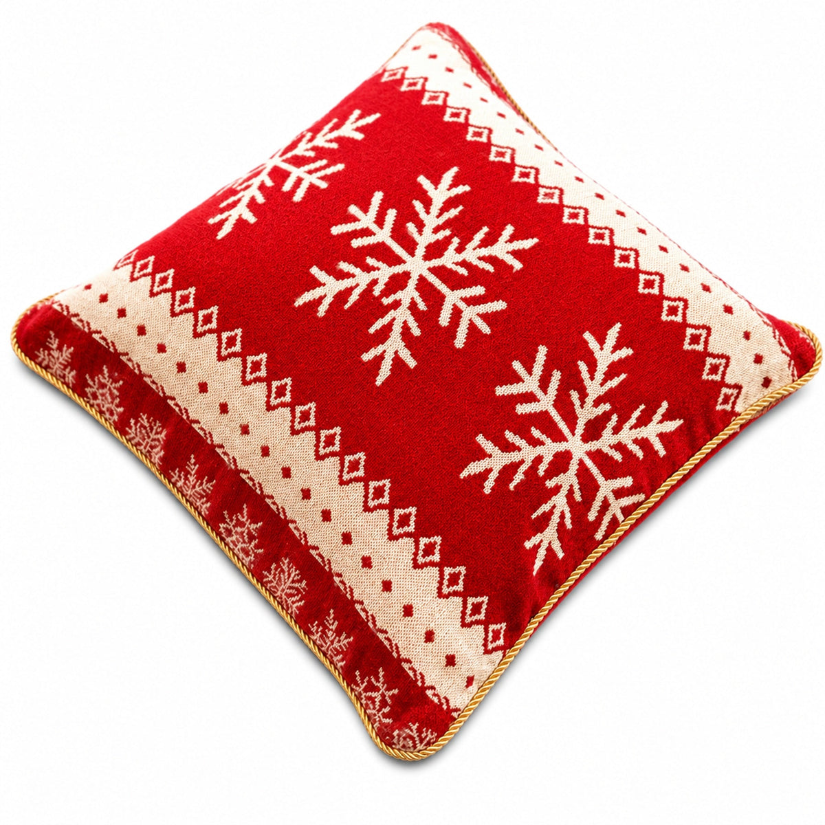 a red and white pillow with snowflakes