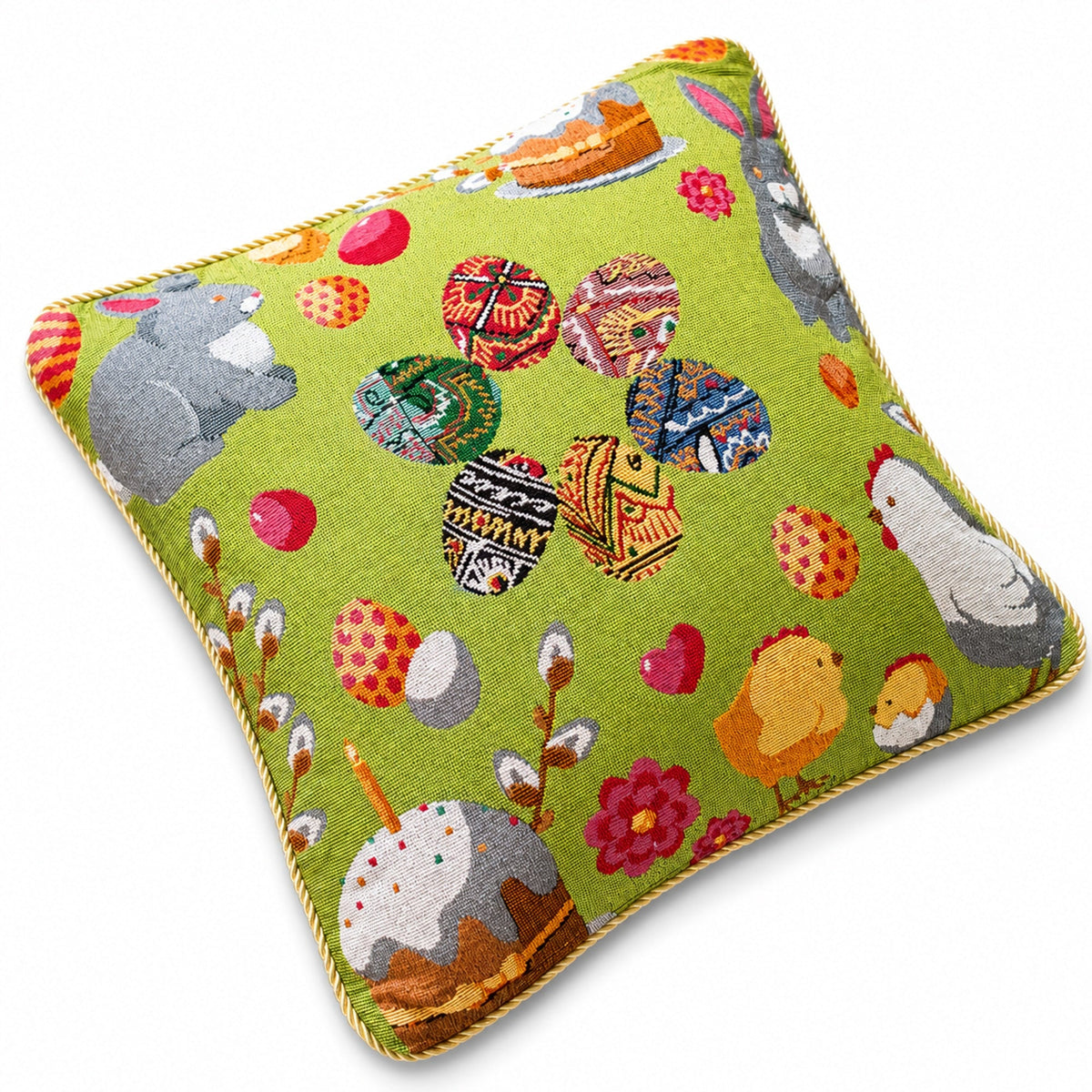a green pillow with a design on it