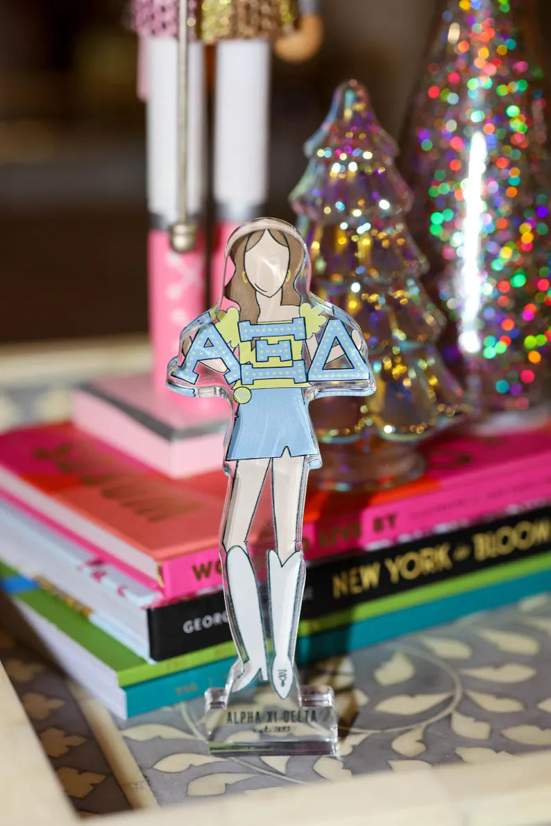 a paper cut out of a girl