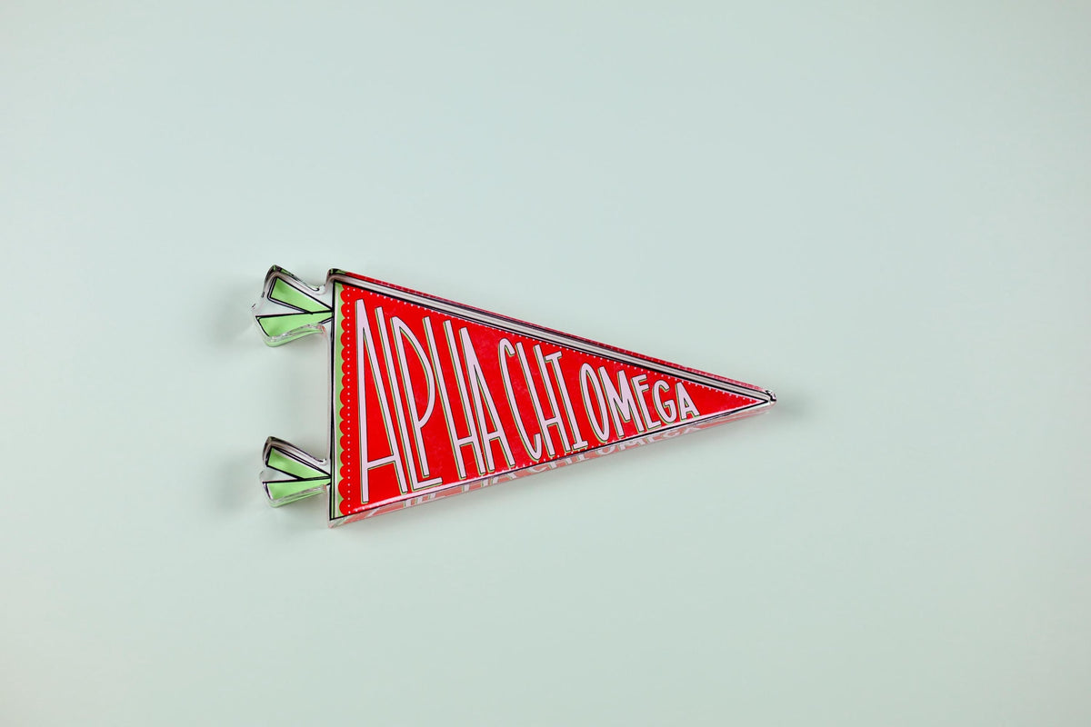 a red triangular object with white text