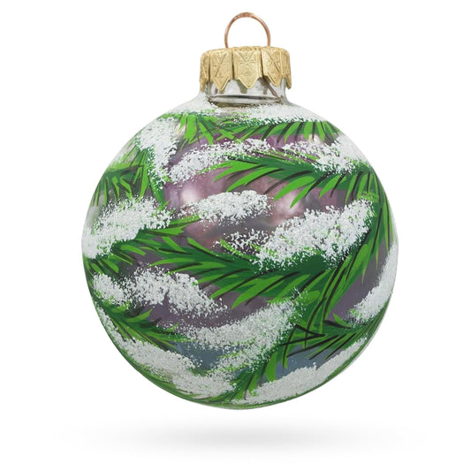 a christmas ornament with a green and white design