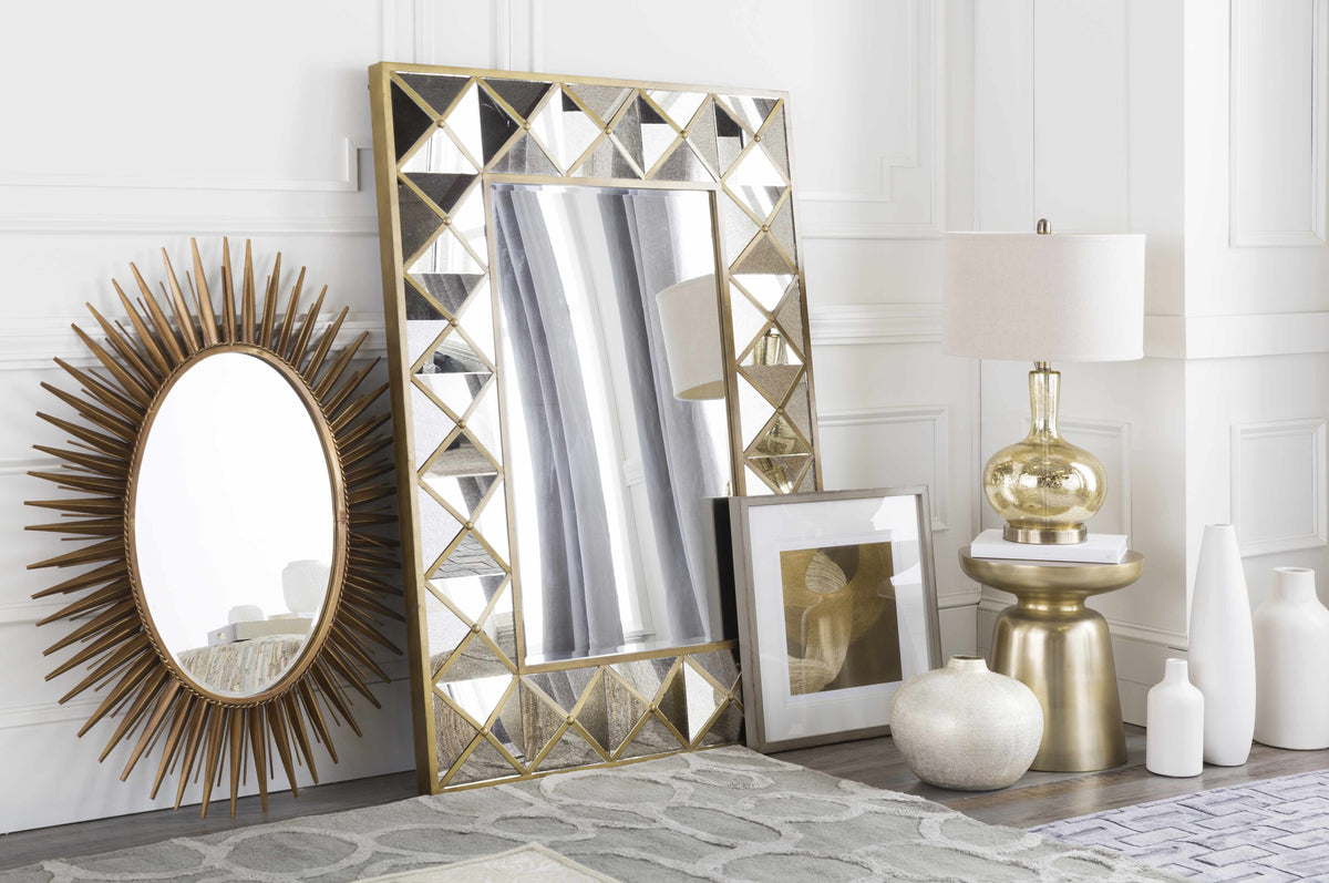 a mirror and picture frame in a room