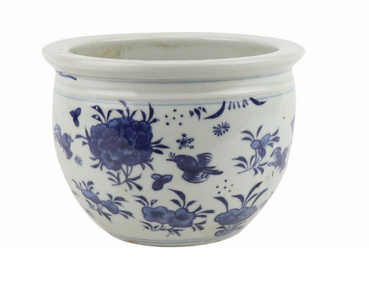 a white and blue flowered pot