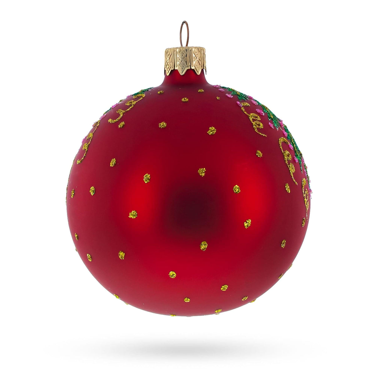 a red christmas ornament with gold and green decorations
