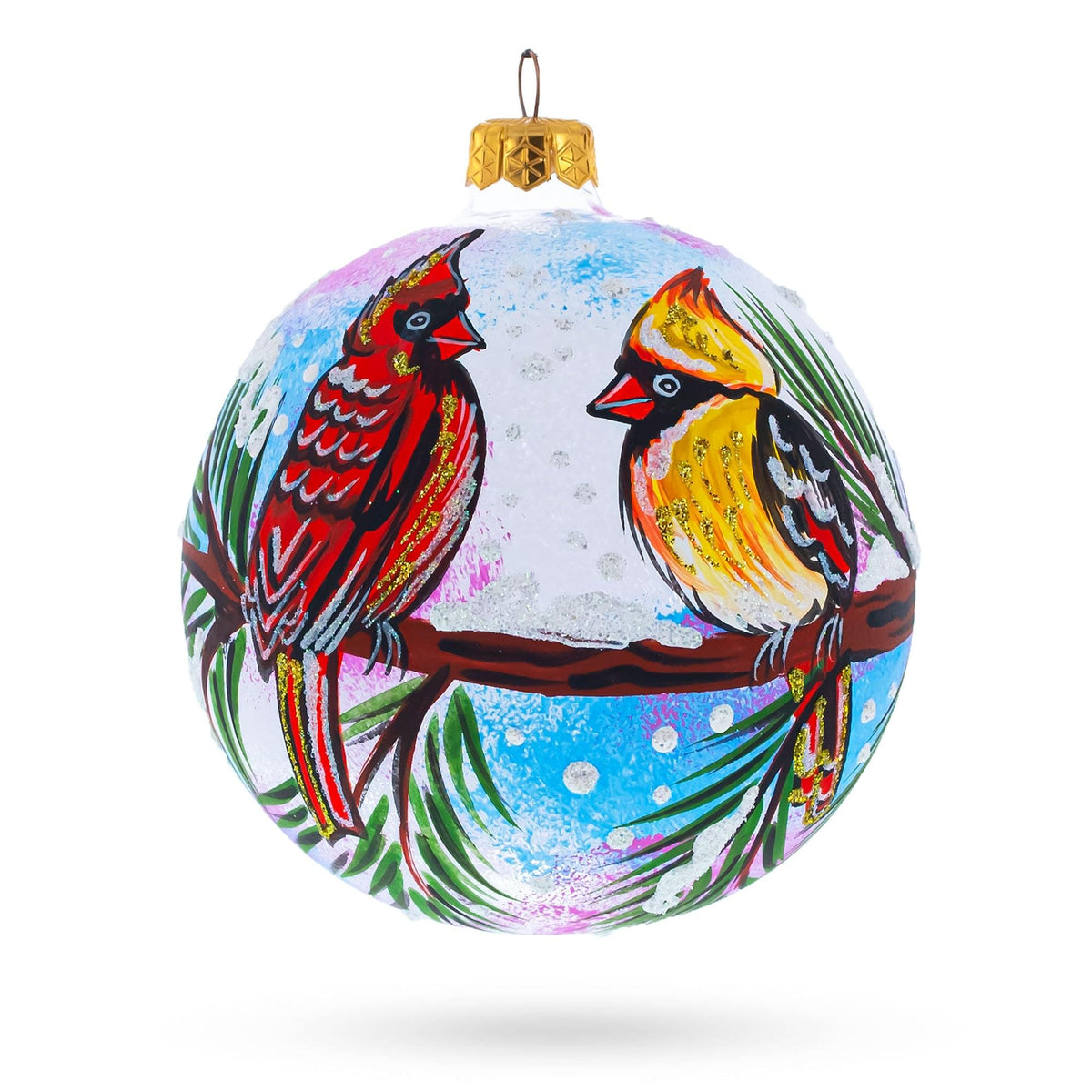 a painted ornament with birds on a branch