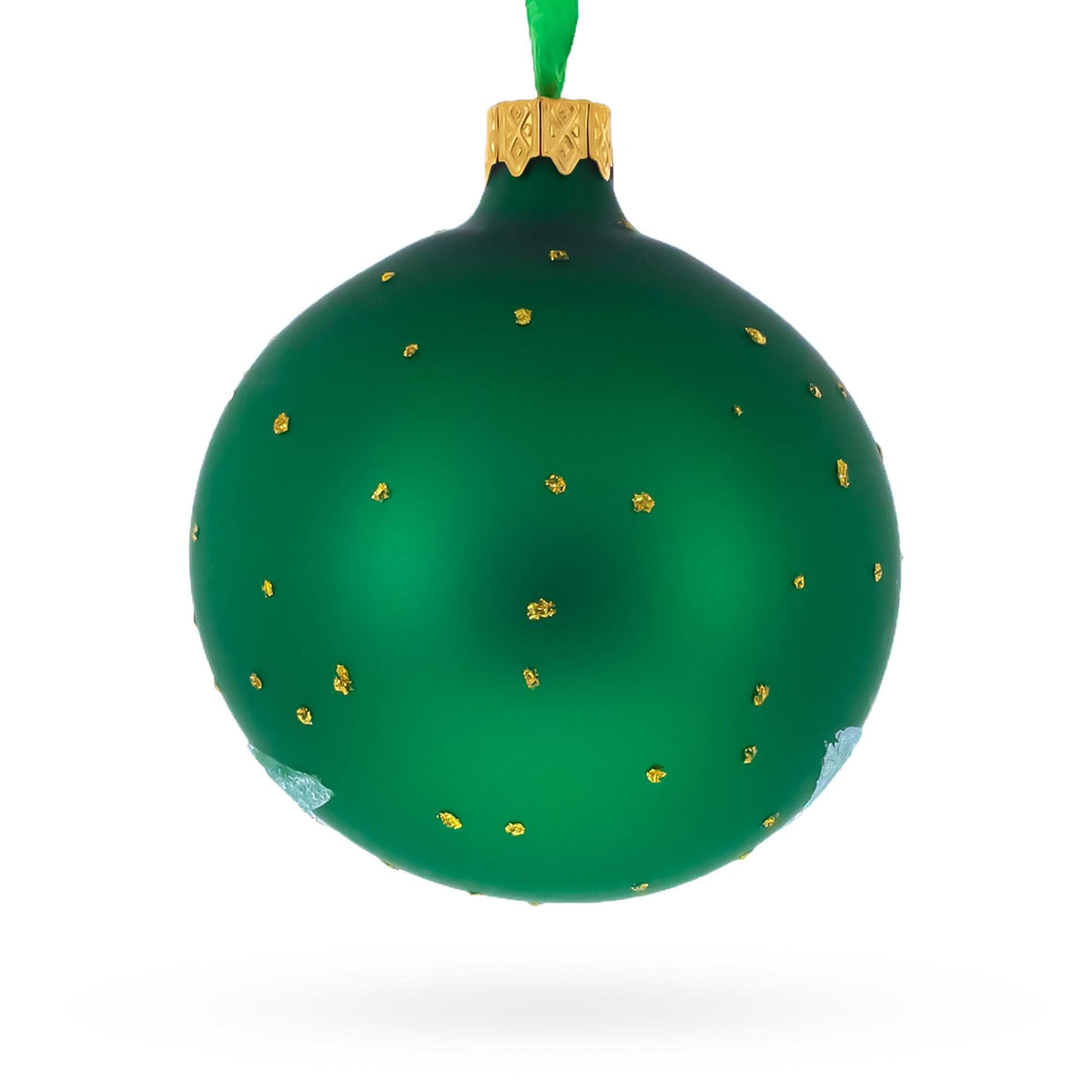 a green and gold christmas ornament