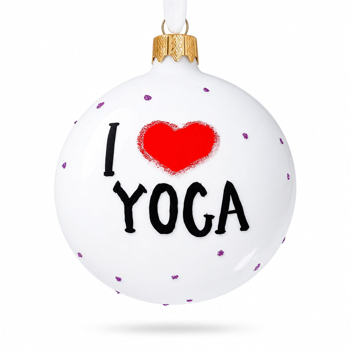a white christmas ornament with black text and a red heart