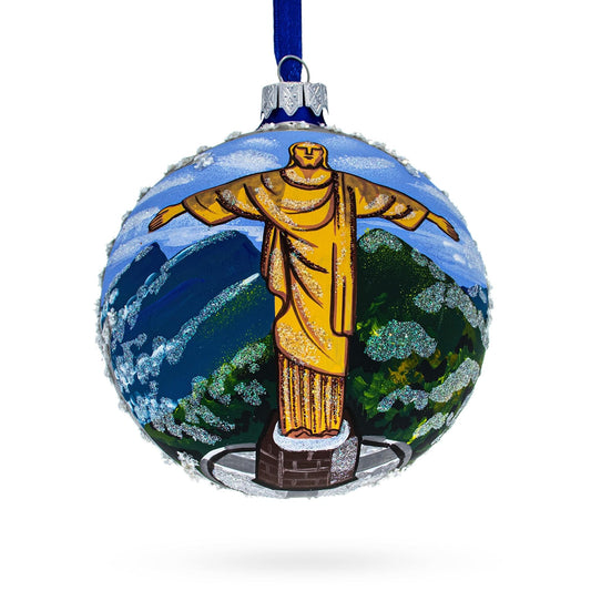 a christmas ornament with a painting of a man on a blue ribbon