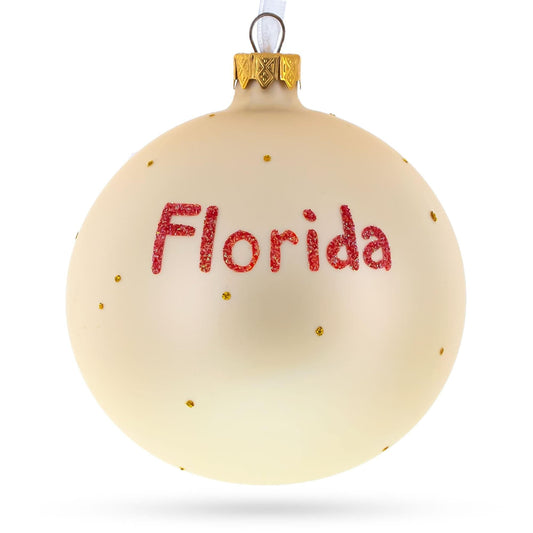 a white ornament with red text