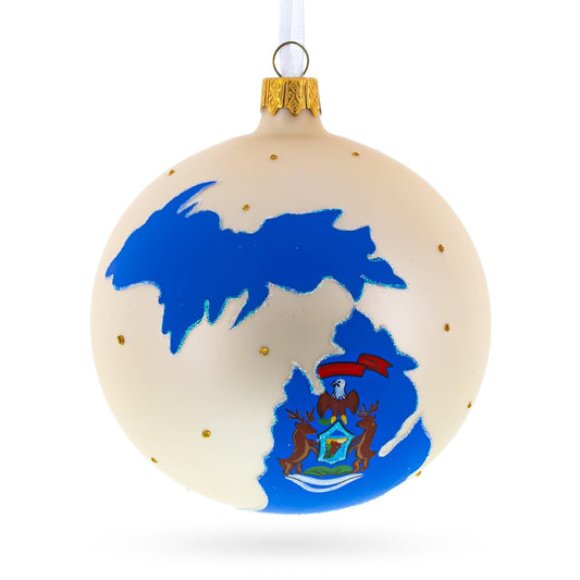 a white and blue christmas ornament