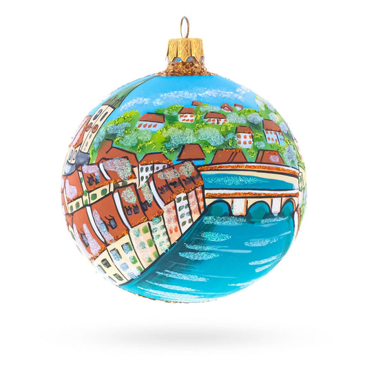 a painted ball with a bridge and a river