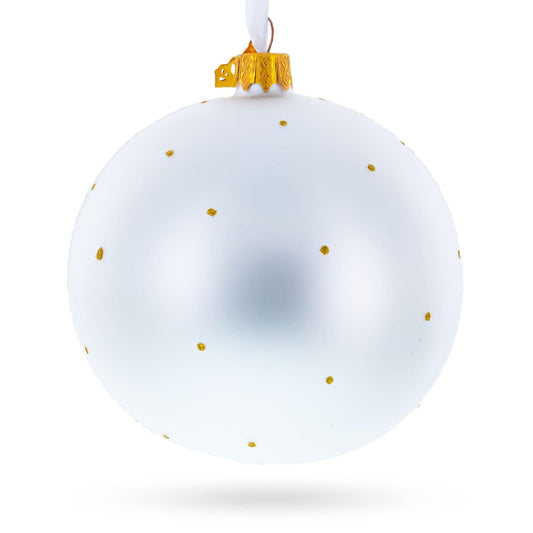 a white and gold christmas ornament