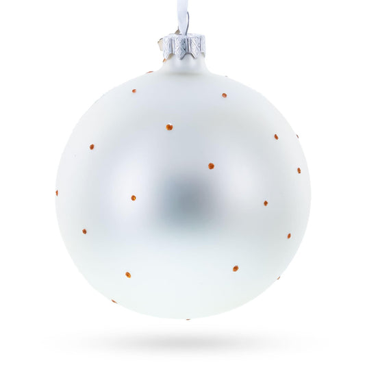 a white and orange christmas ornament