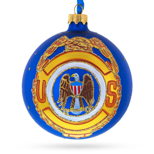 a blue and gold ornament with a logo
