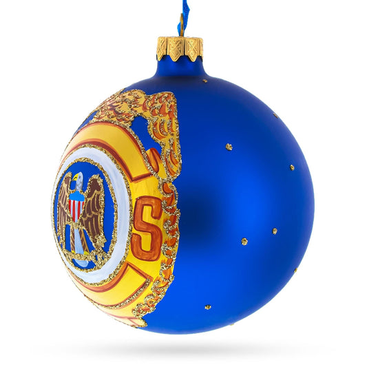 a blue and gold christmas ornament