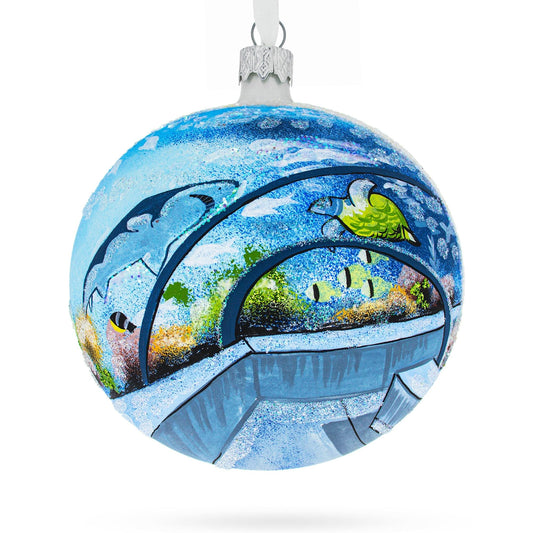 a blue and white ornament with a painting on it