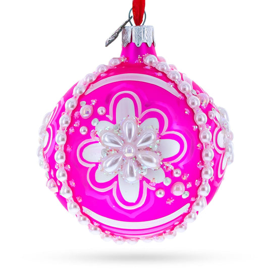 a pink and white ornament