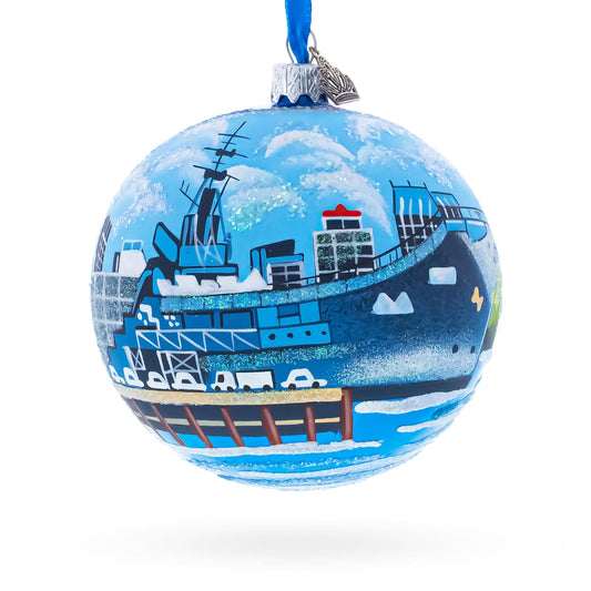 a blue ball with a ship painted on it