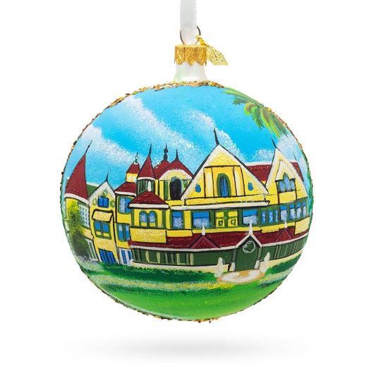 a colorful christmas ornament with a picture of houses