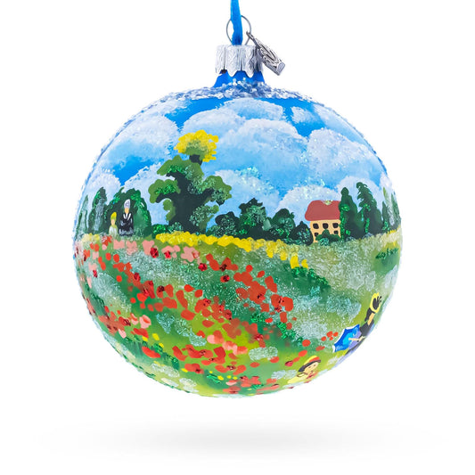 a painted ball with a landscape on it