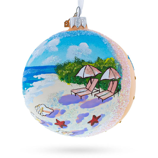 a christmas ornament with a beach scene