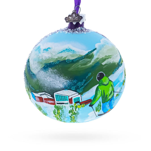 a christmas ornament with a painting on it