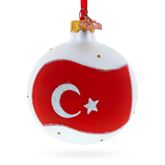a red and white christmas ornament