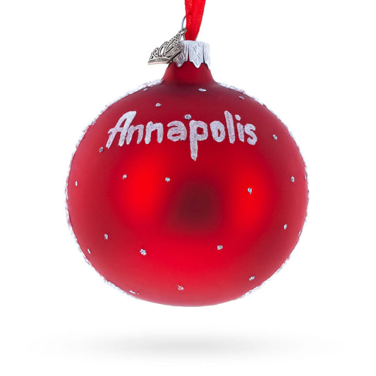 a red christmas ornament with white text