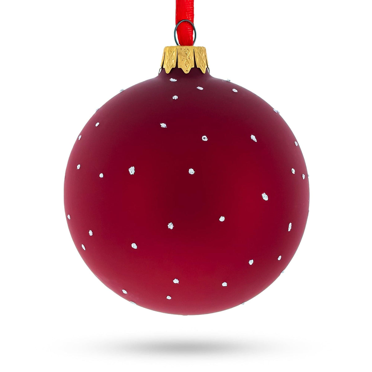 a red and white christmas ornament