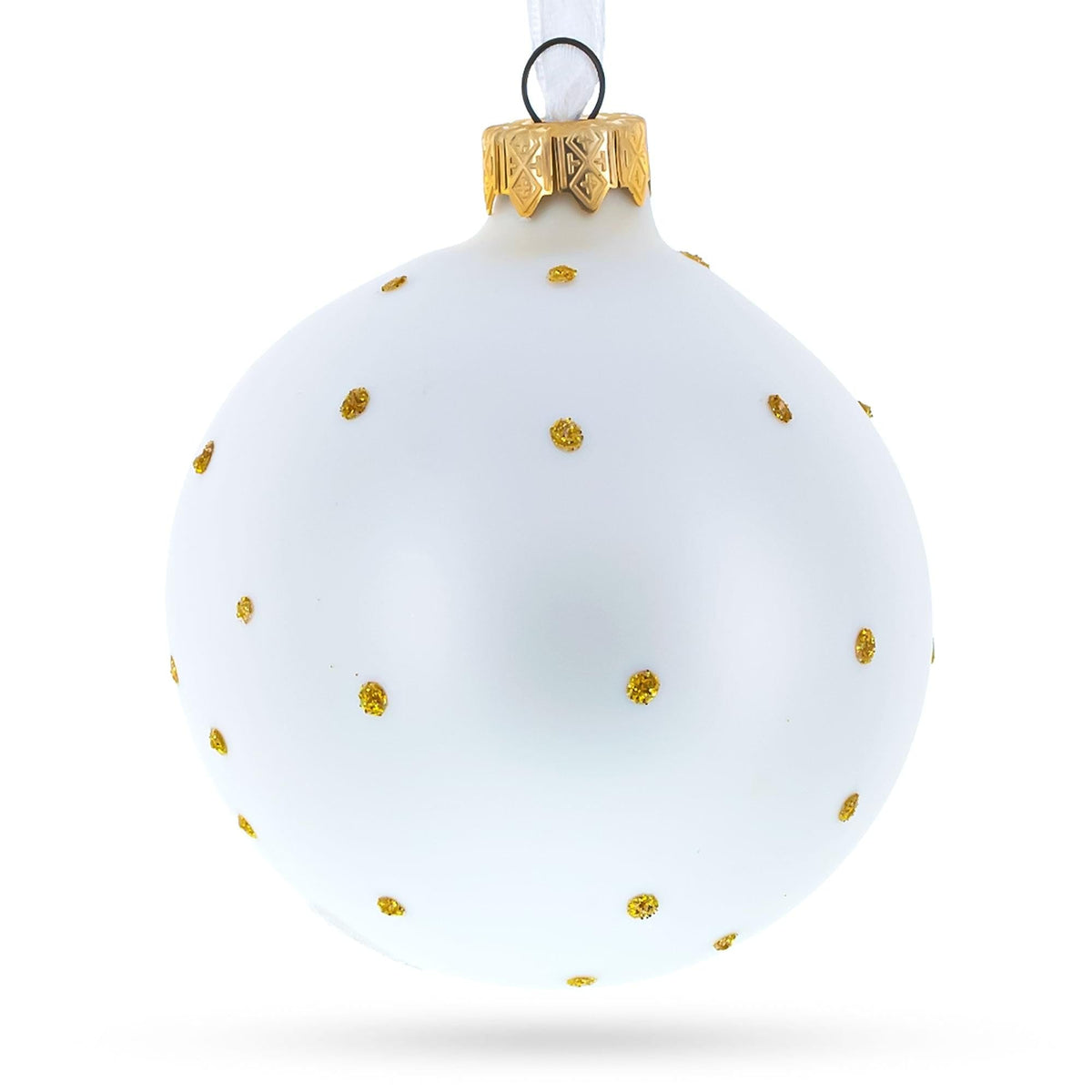 a white and gold christmas ornament