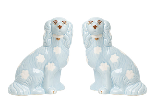 a pair of ceramic dogs