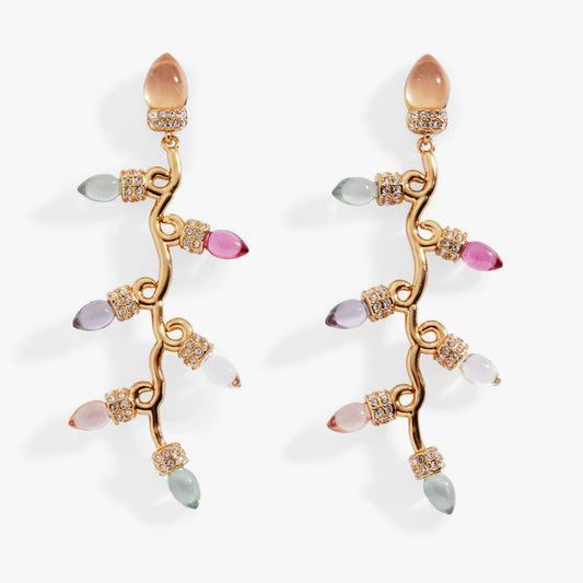 a pair of earrings with colorful lights