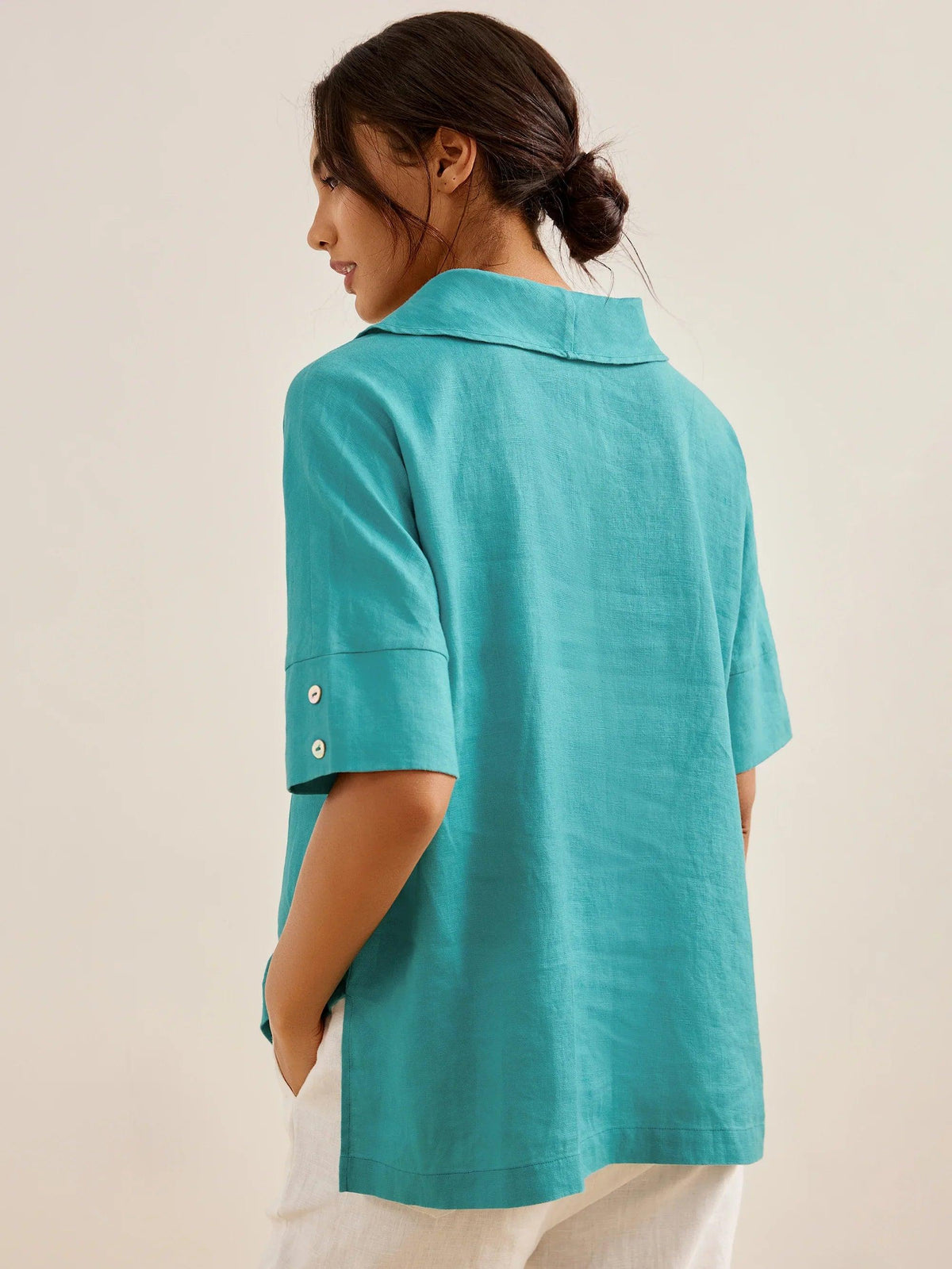 a woman in a blue dress