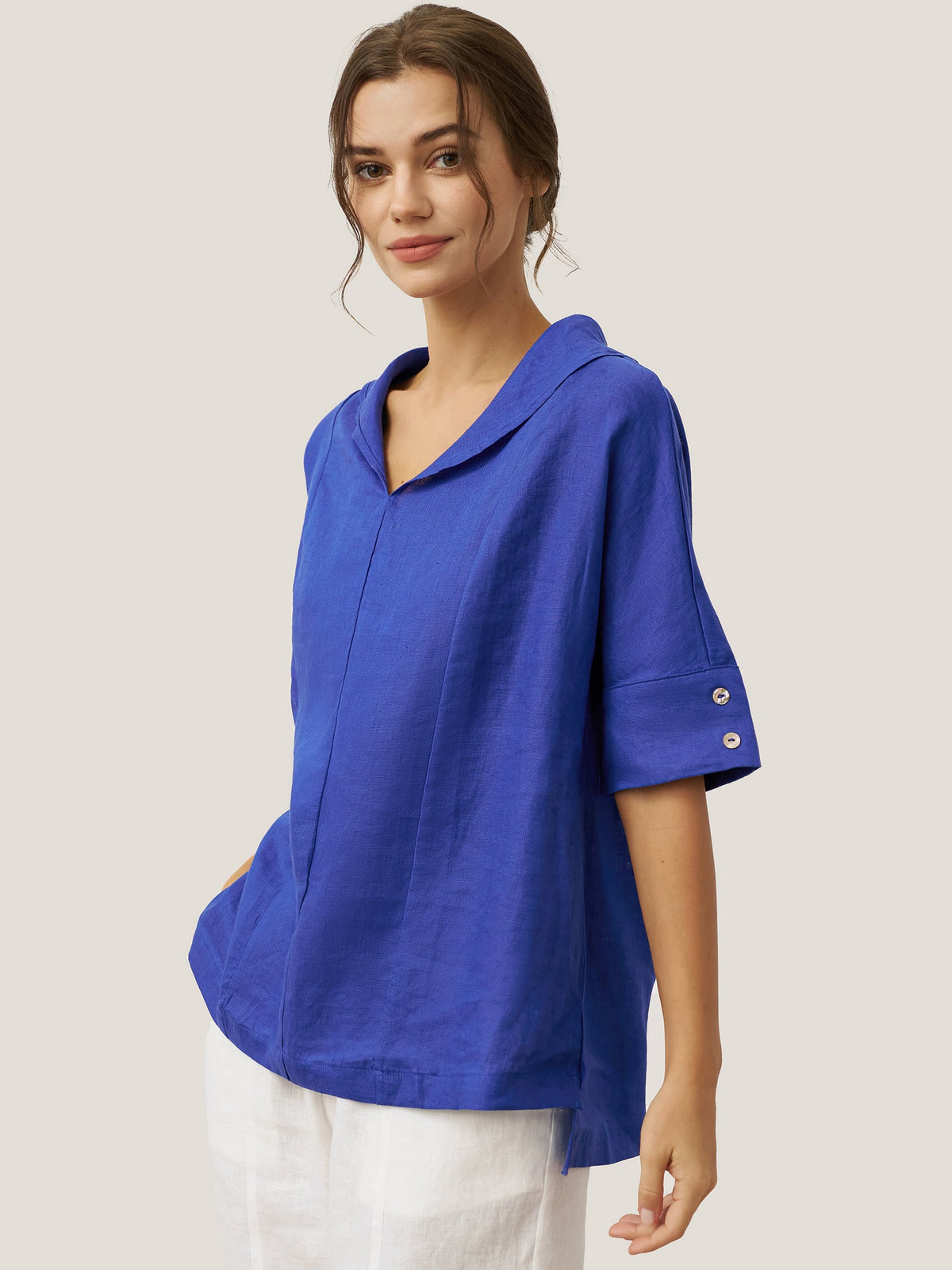 a woman in a blue shirt