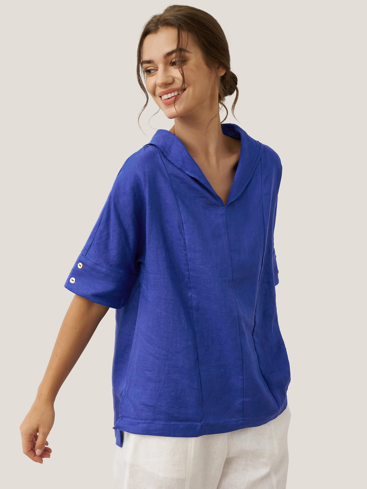 a woman in a blue shirt