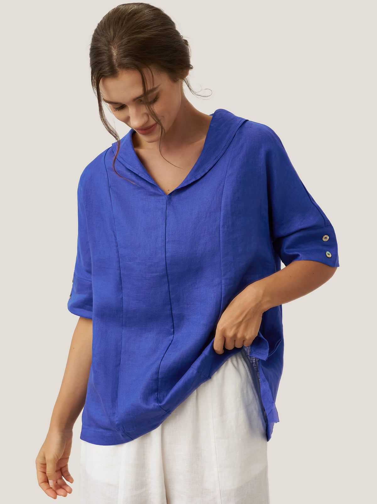 a woman in a blue shirt