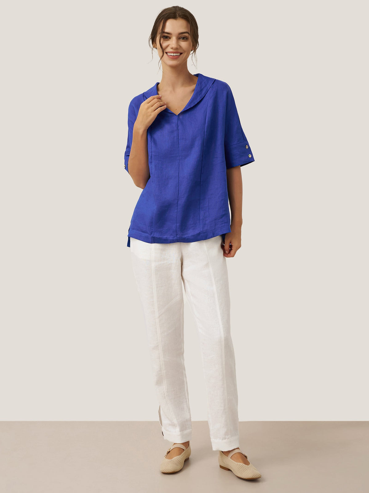 a woman in a blue shirt