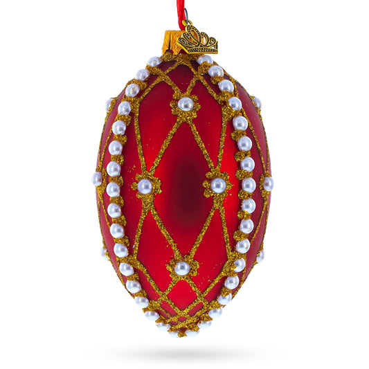 a red and gold decorated egg