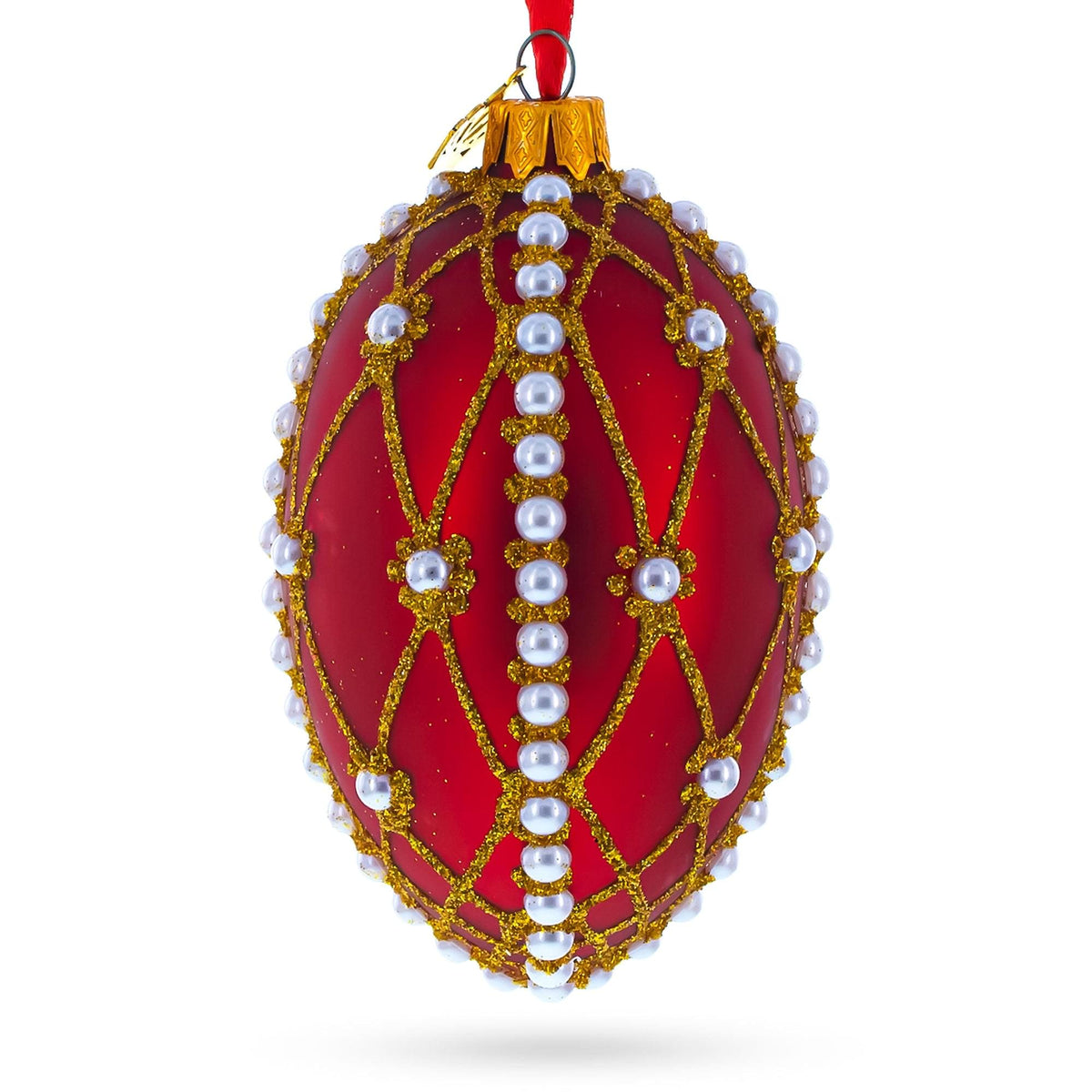 a red and gold decorated christmas ornament